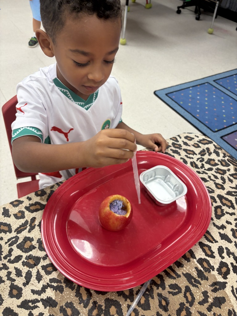child with apple