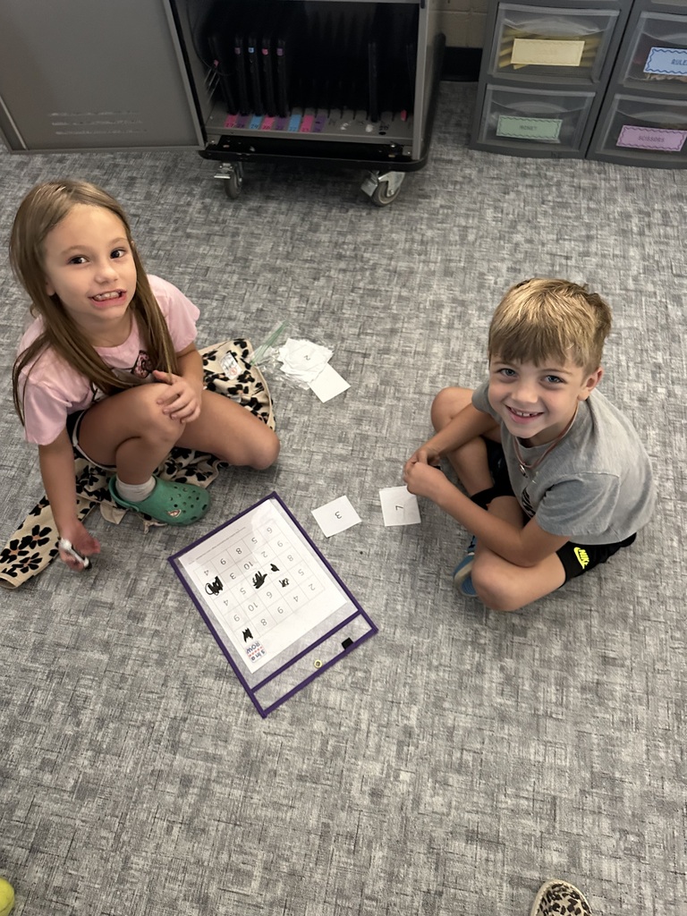 student with number cards