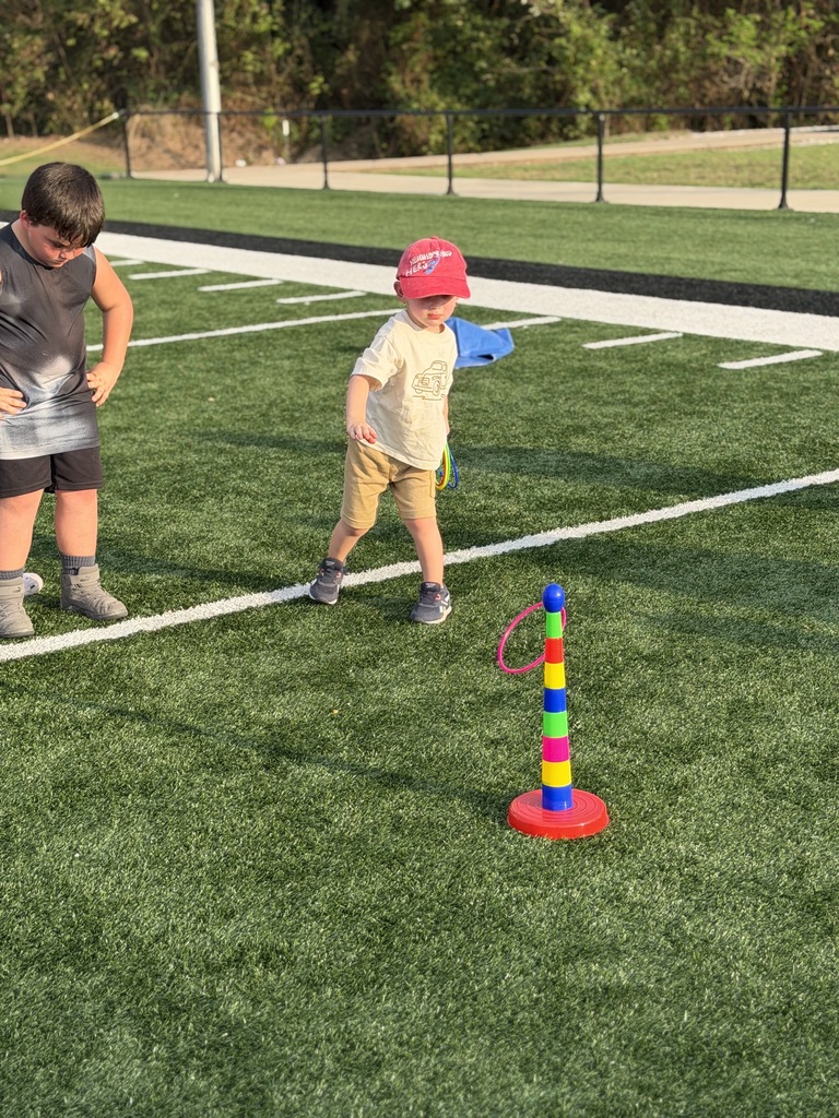 Kids playing ring toss