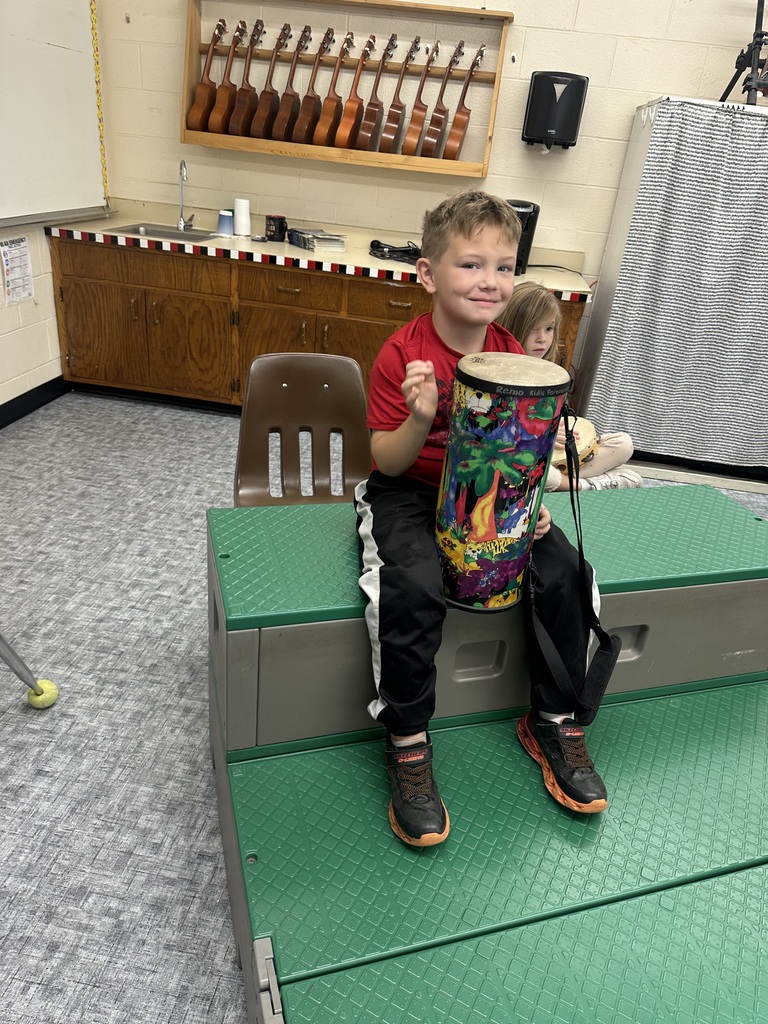 student playing an instrument
