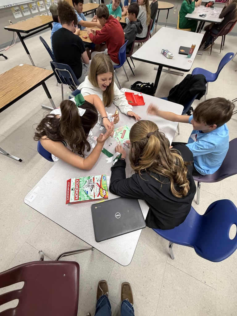 students playing monopoly