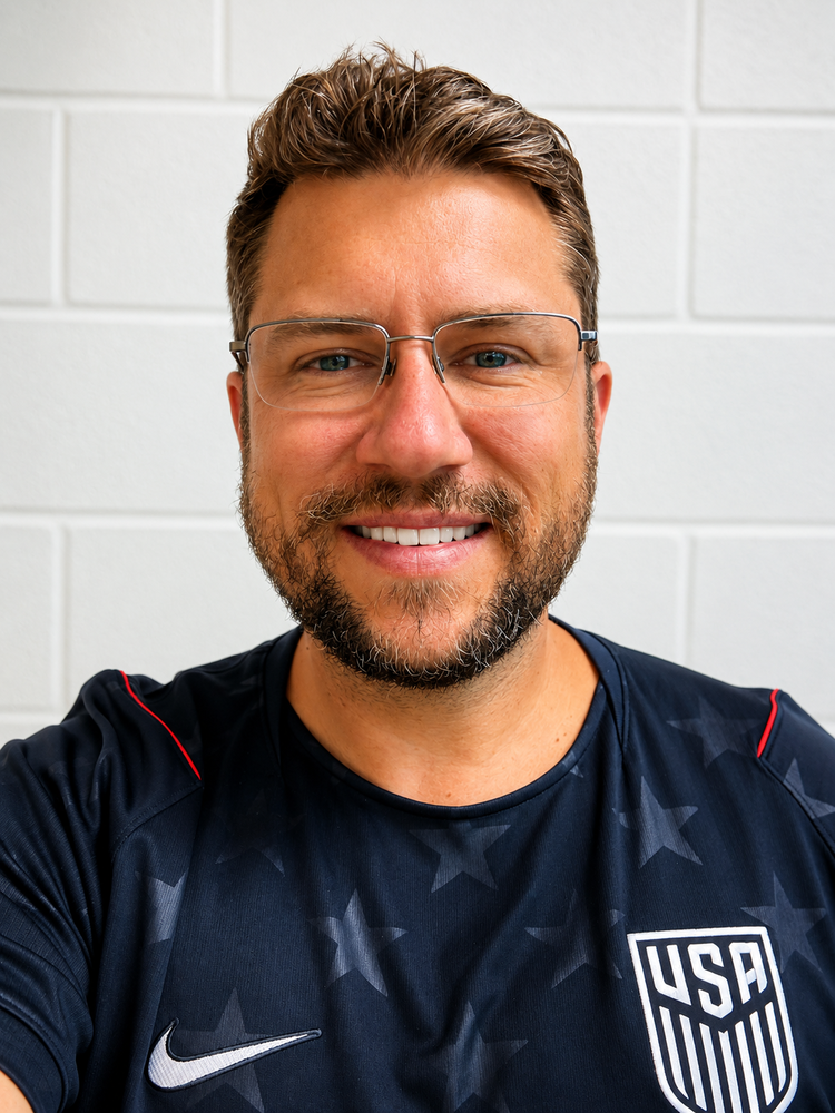 Even Ivory, woth glasses in a USA jersey