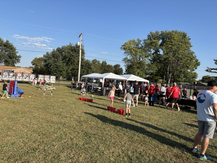 tailgate party, kids playing yard games with tailgate tents