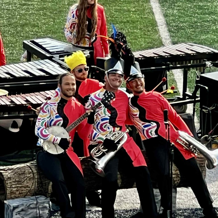 band members posing 