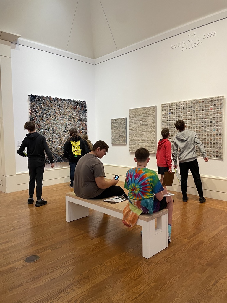 students looking at art