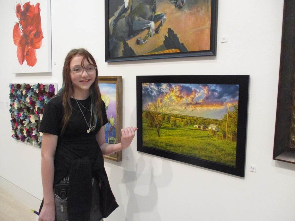 students looking at art