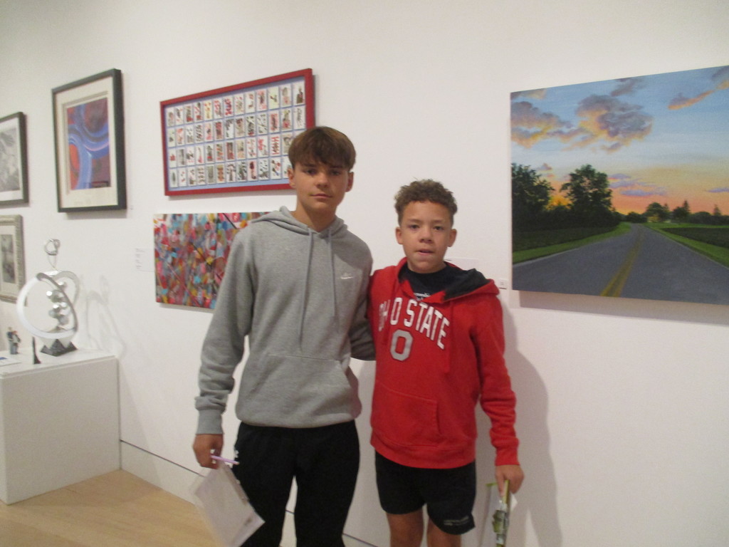 students looking at art