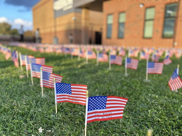 flags with names outside of building