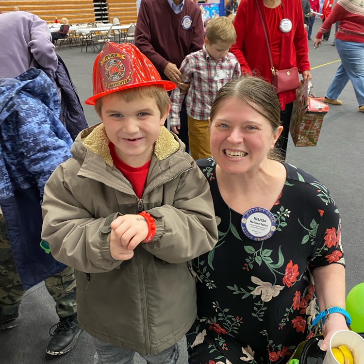 students at Christmas party with woman