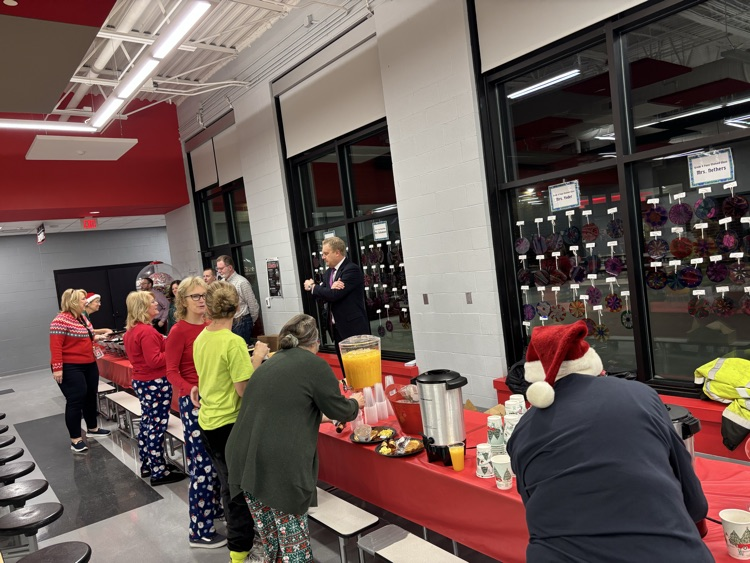 staff members going through a breakfast line
