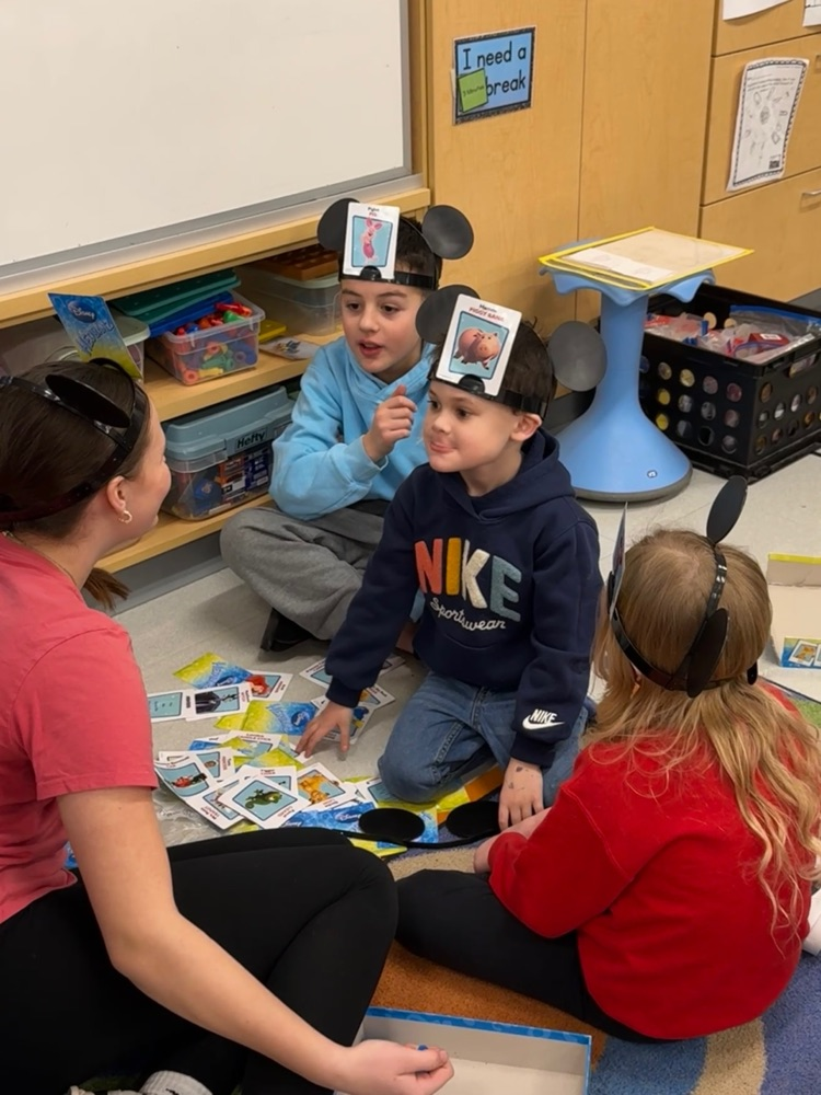 students in classroom playing games 