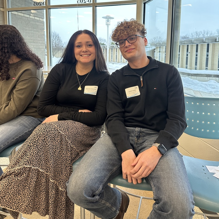 two students sitting 