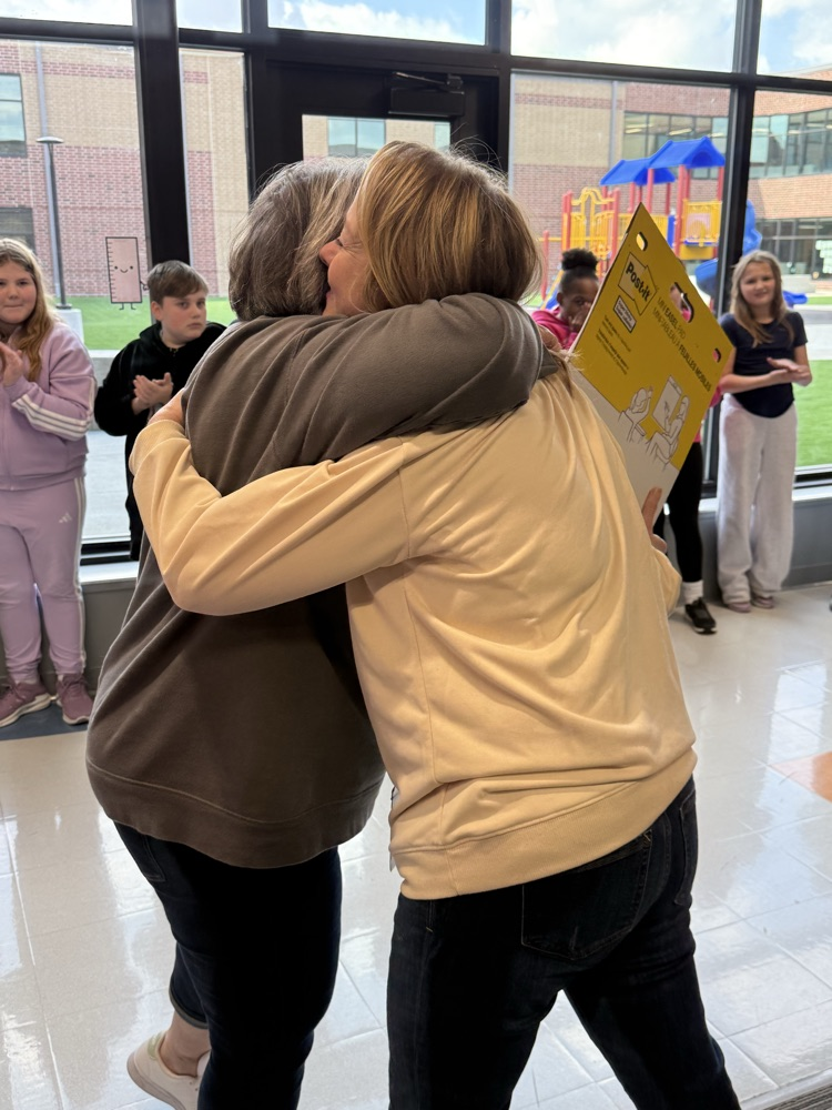 2 women’s going a hug of congratulations
