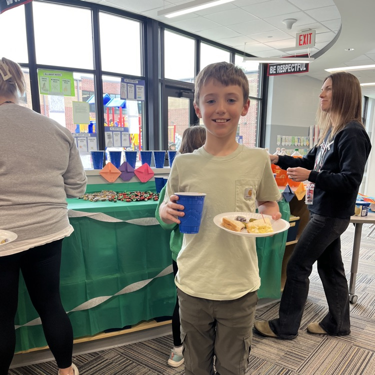 student with plate full of food