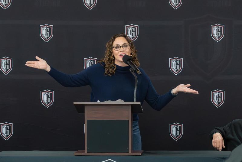 Woman speaking at podium