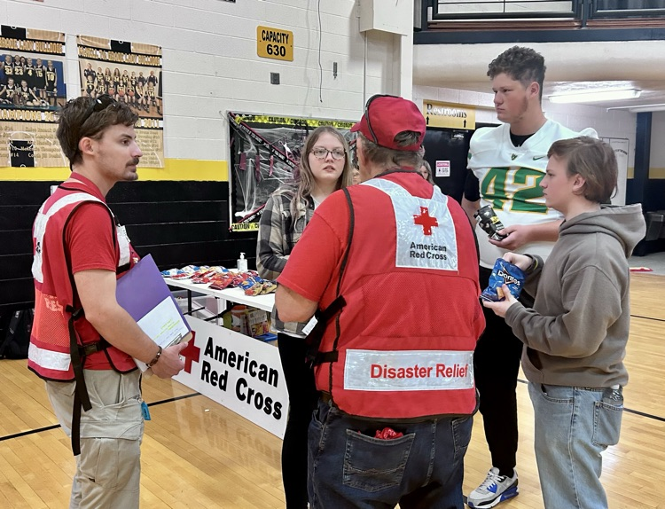 EMT working with Red Cross in Drill