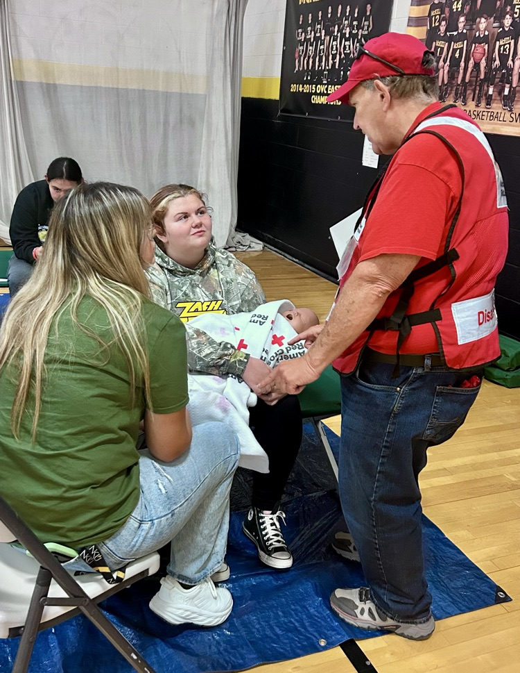 EMT working with Red Cross in Drill