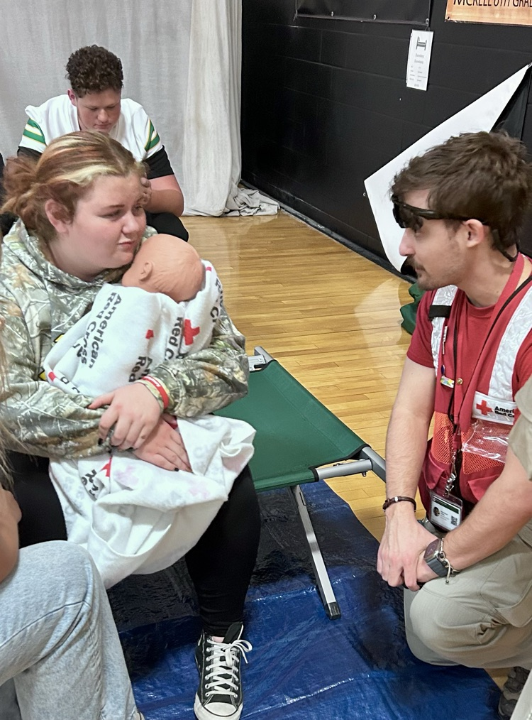 EMT working with Red Cross in Drill