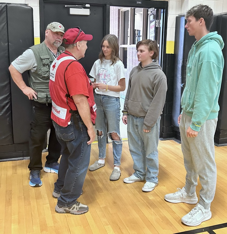 EMT working with Red Cross in Drill