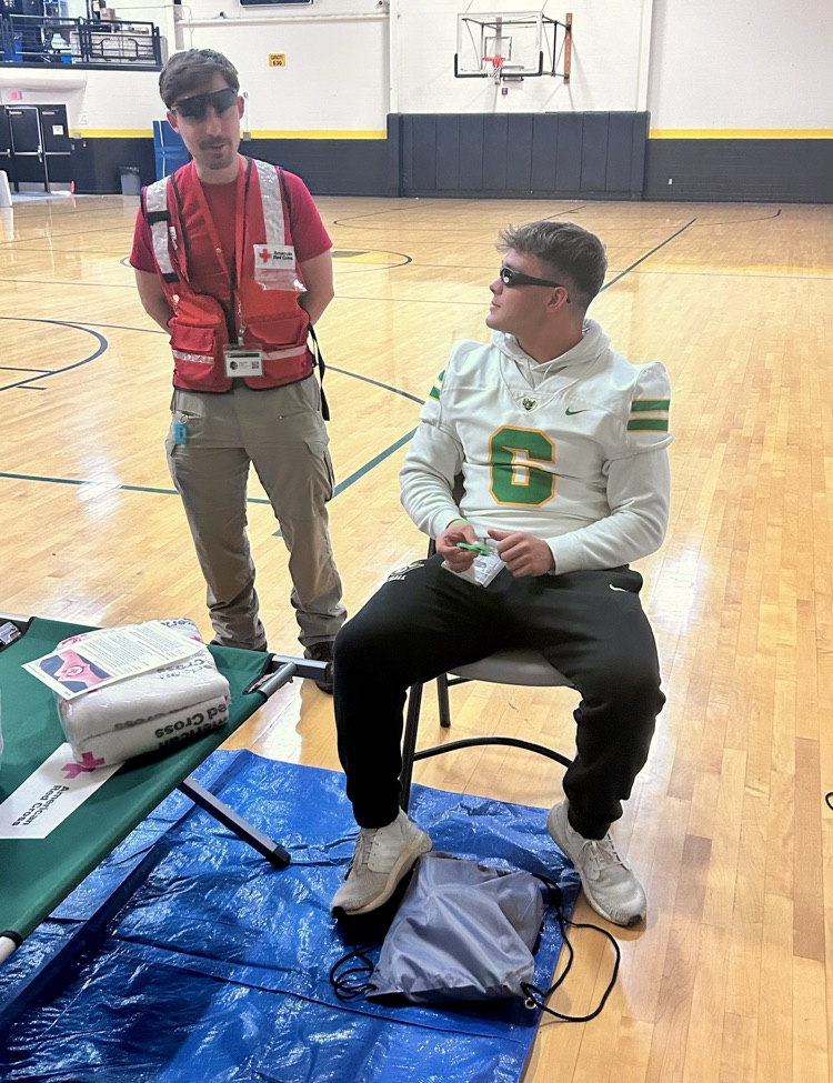 EMT working with Red Cross in Drill
