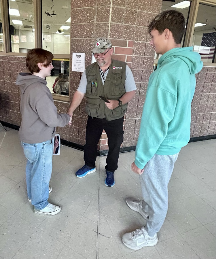 EMT working with Red Cross in Drill