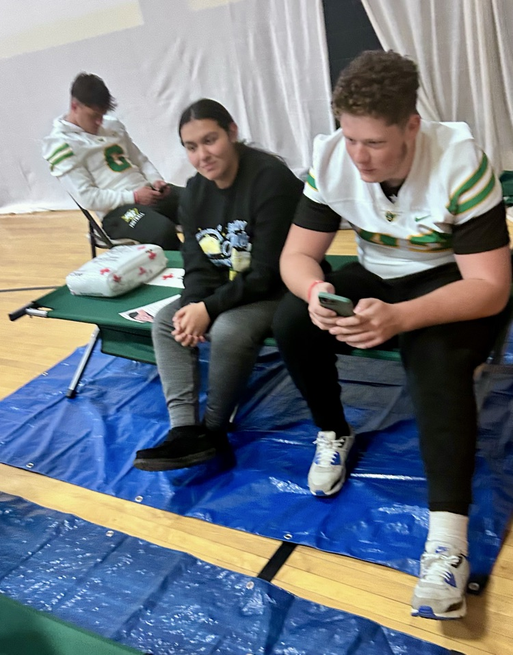 EMT working with Red Cross in Drill