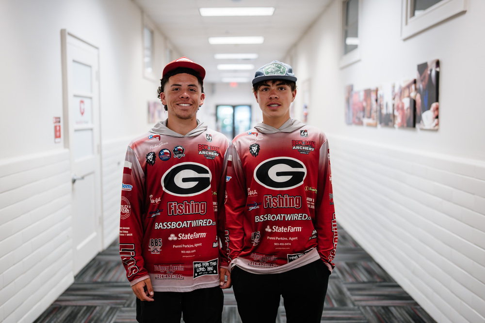 Two boys in fishing shirts