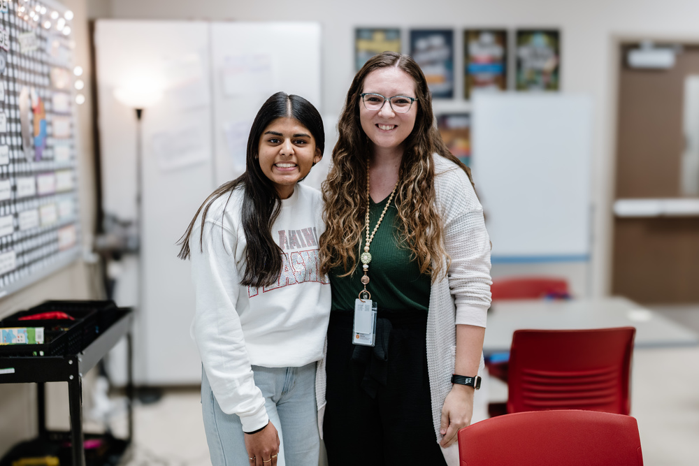 Teacher & Student Smiling