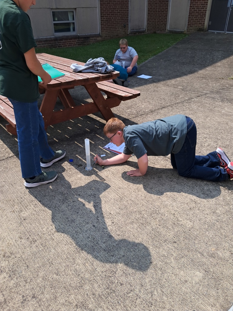 boy measuring water