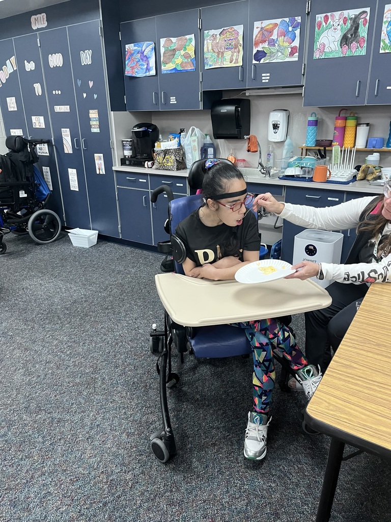 Student eating pawpaw