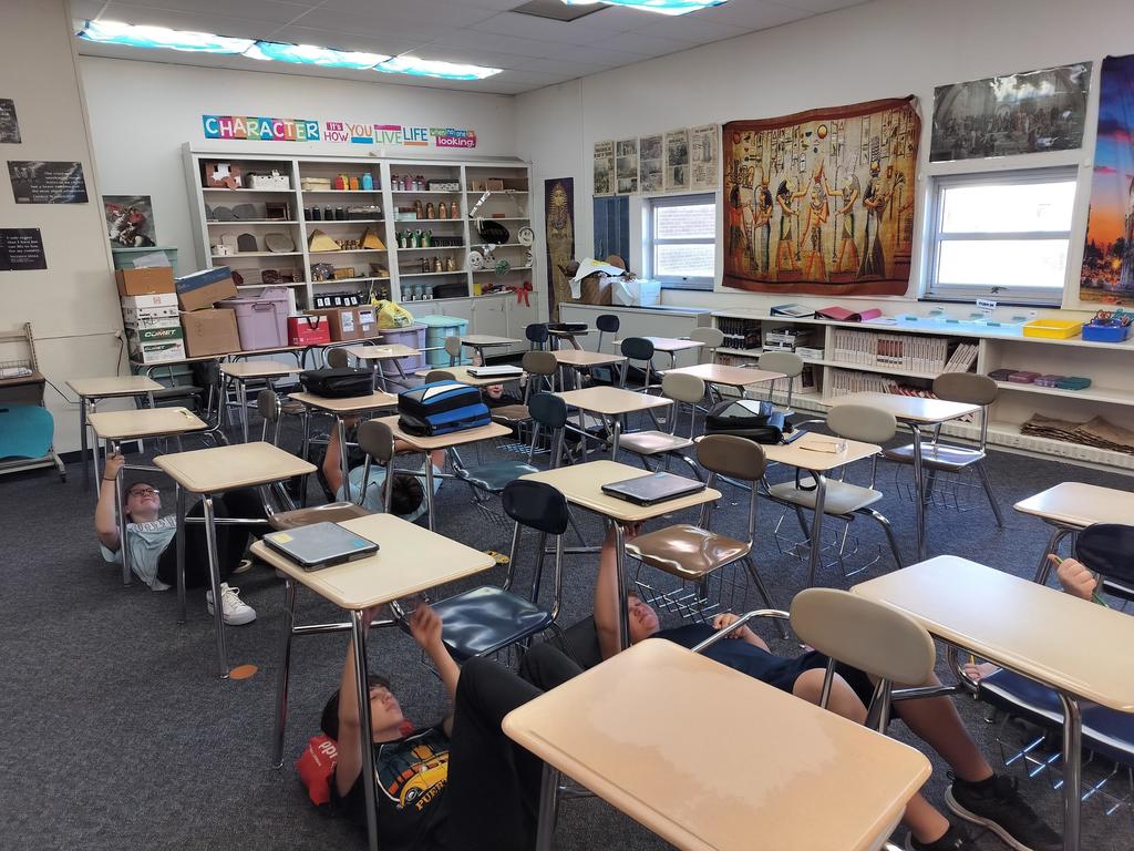 Students working on their cave art