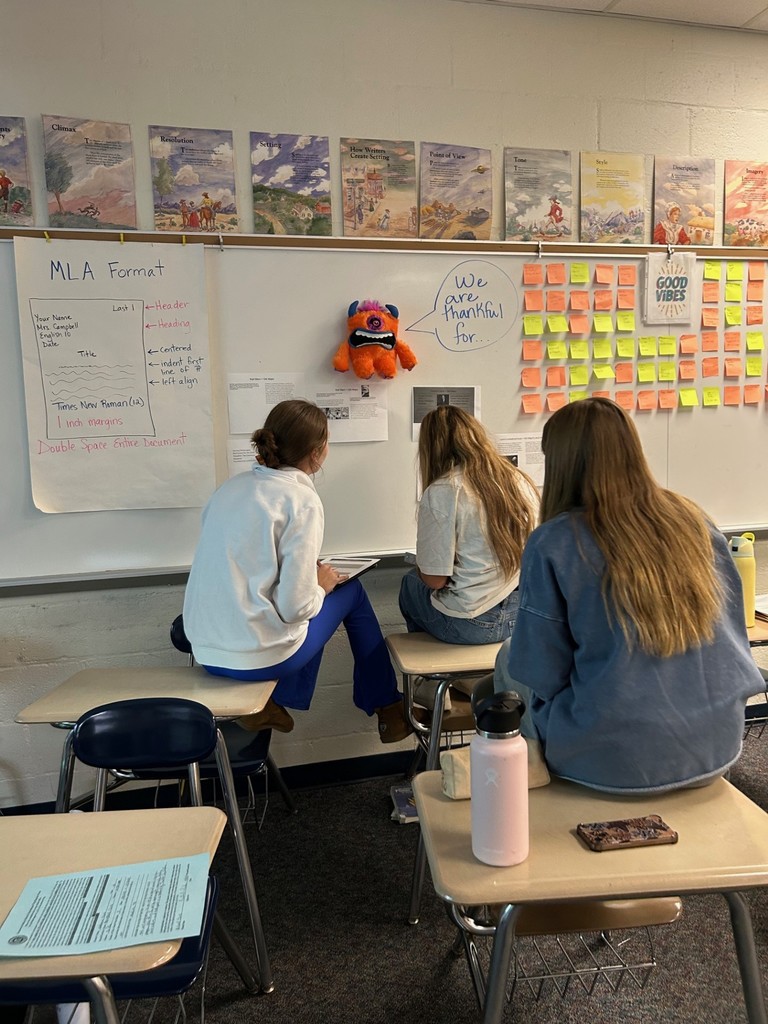 Students taking notes