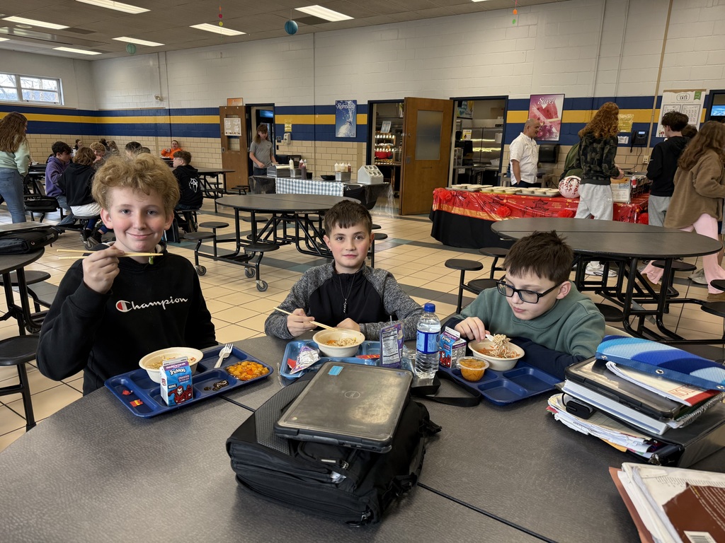 Middle School Students enjoying specially made Ramen Noodle Bowls