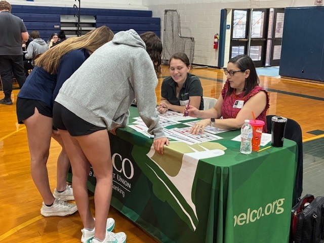 Addie Anstine gets some loan advice to manage her finances at the Reality Fair.