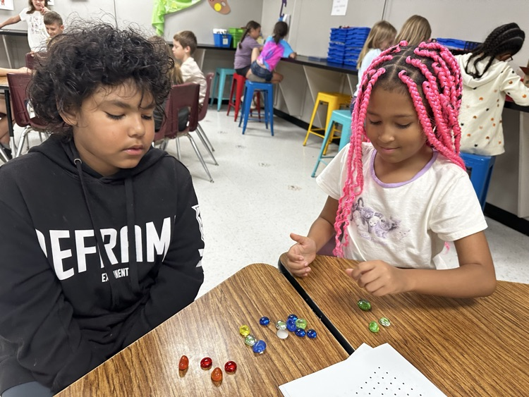 FabLab fun this week! Students learned five new math and strategy games to play with Mrs. Eckart. We practiced strategic thinking, multiplication, addition, and good sportsmanship, and had a blast doing it!