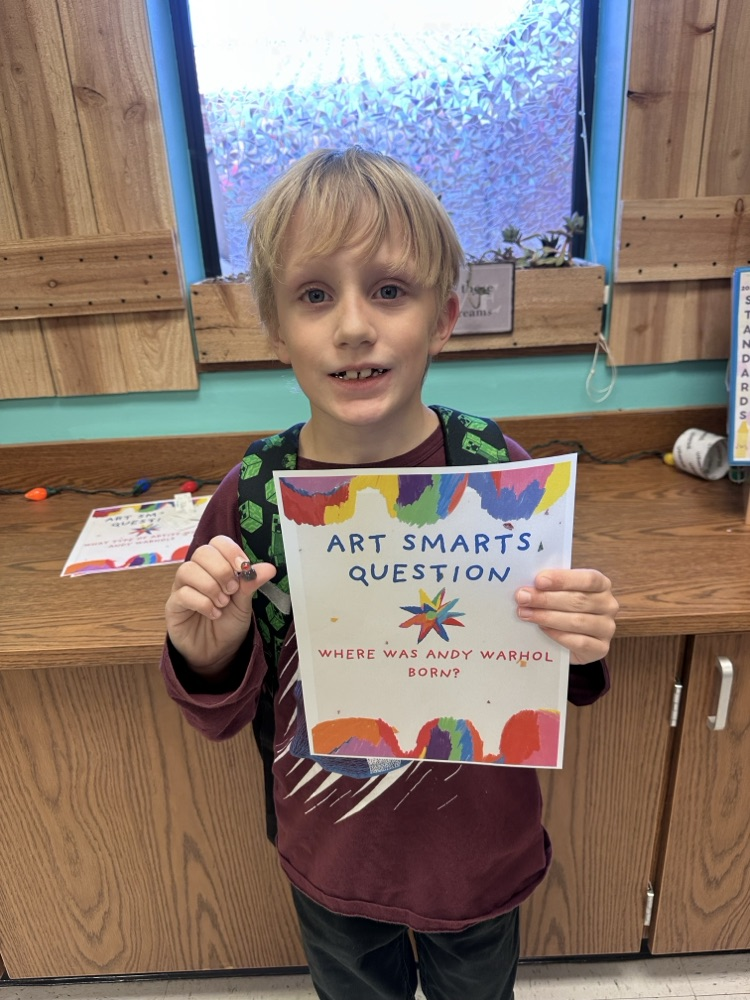 students answering facts about Andy Warhol 