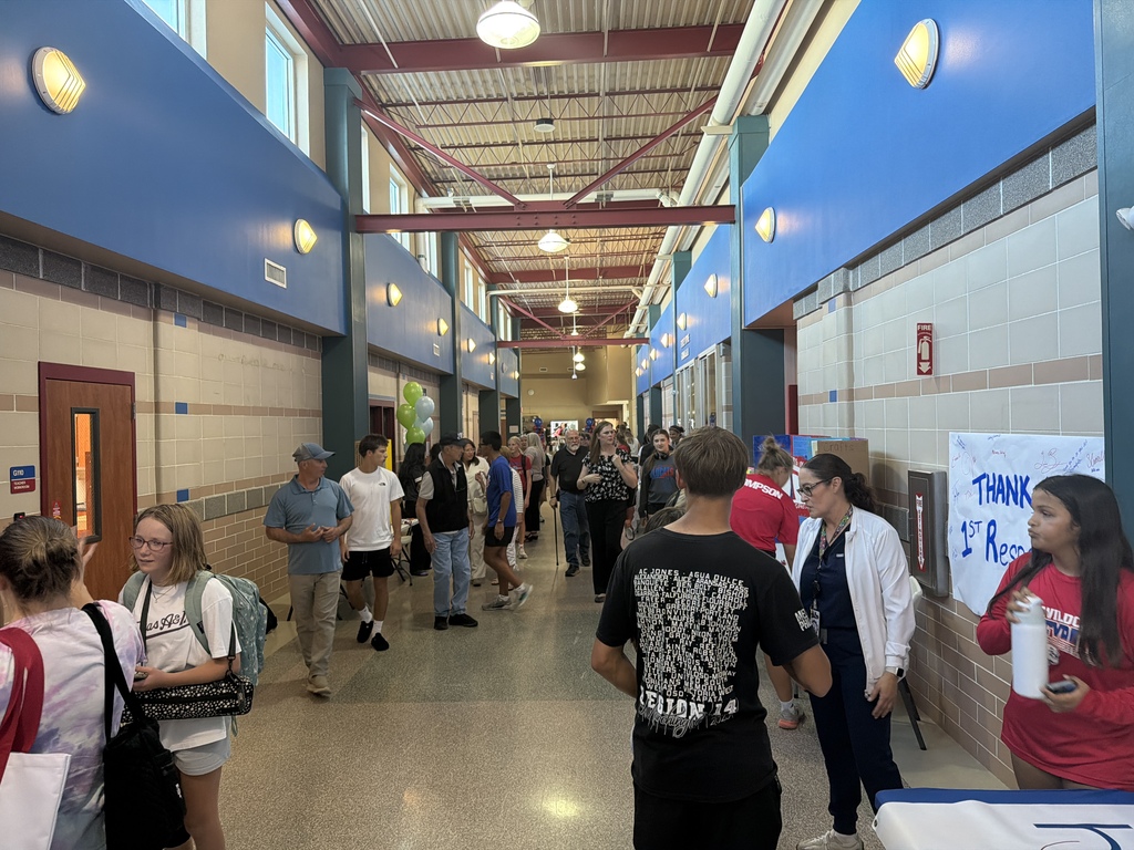 People walking around a high school