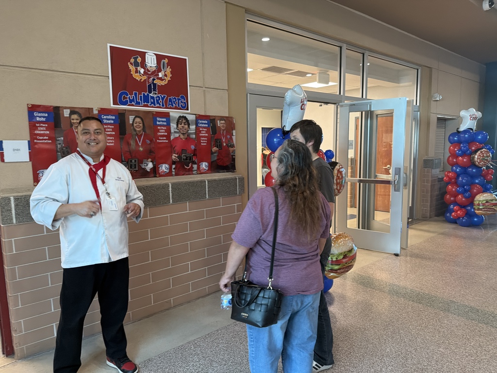The chief speaking to people about his new class room 