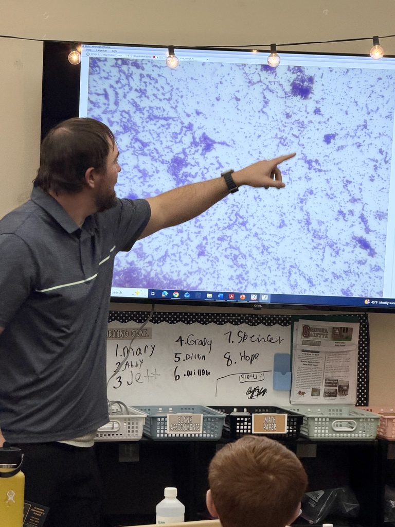 Mr. L showing specimens