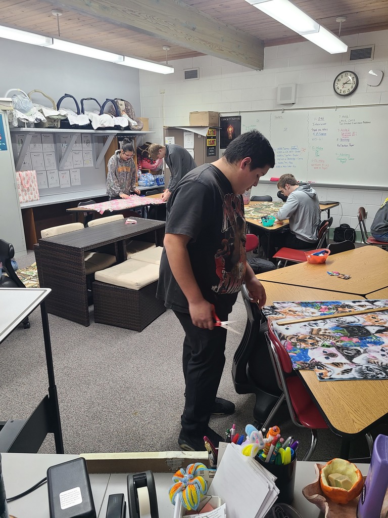 Seniors making Tie-Blankets