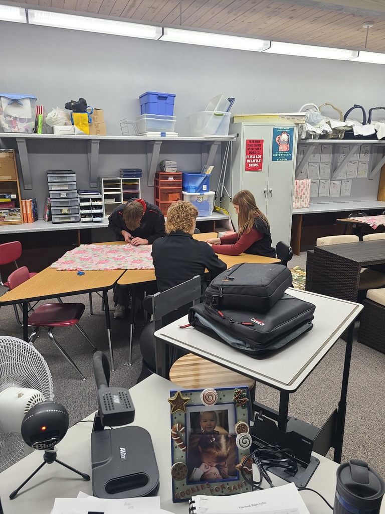 Seniors making Tie-Blankets