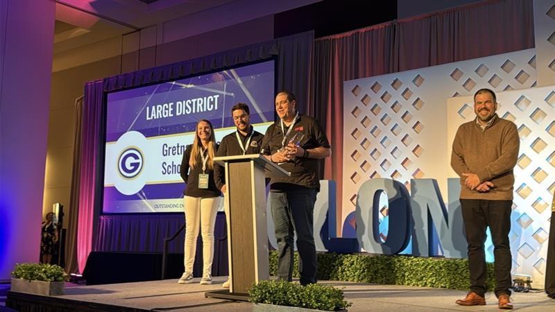 Gretna Technology Team standing on stage accepting Classlink award