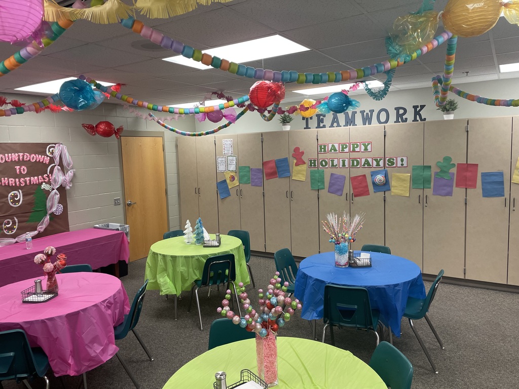 Teacher's Lounge-Candy-Land tables with bright colored cloths, banners and balloons