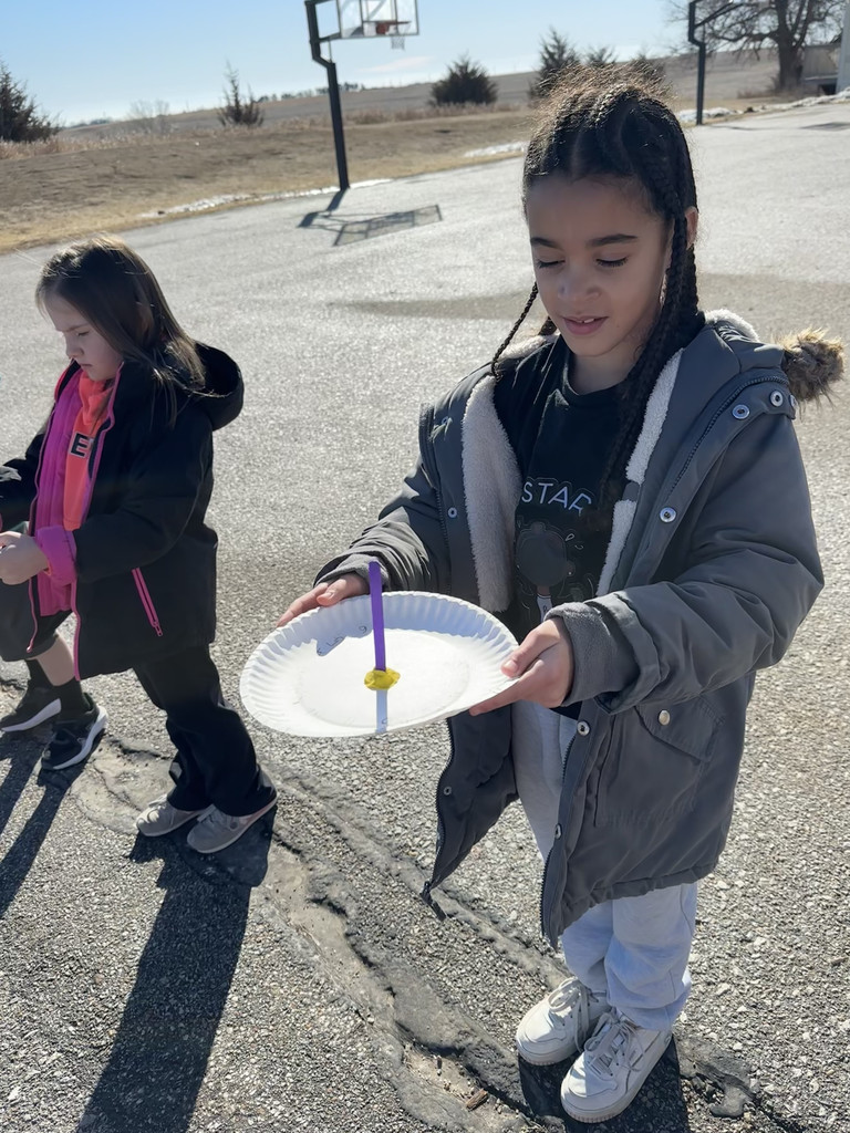 Students in Mrs. Foral's first grade classroom took advantage of the warm sunshine by using their sundials from science class.