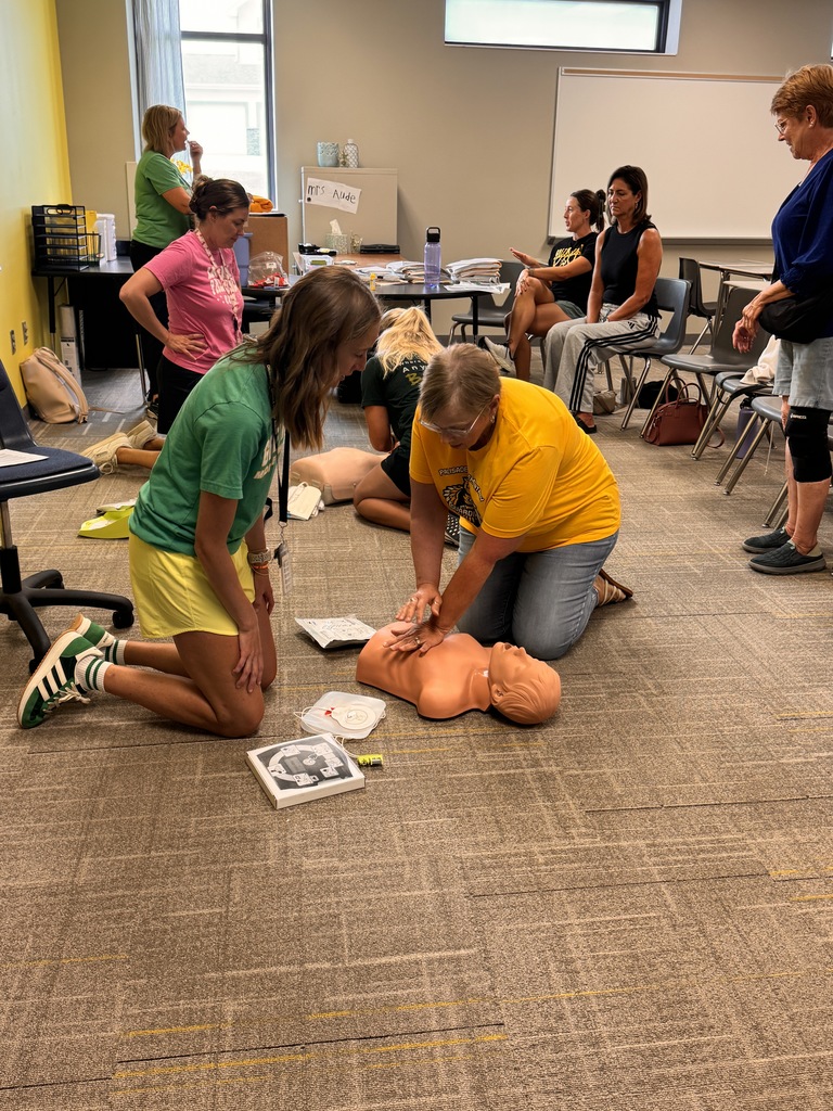 classroom of gretna public school coaches and admin training with nurses on CPR and AED