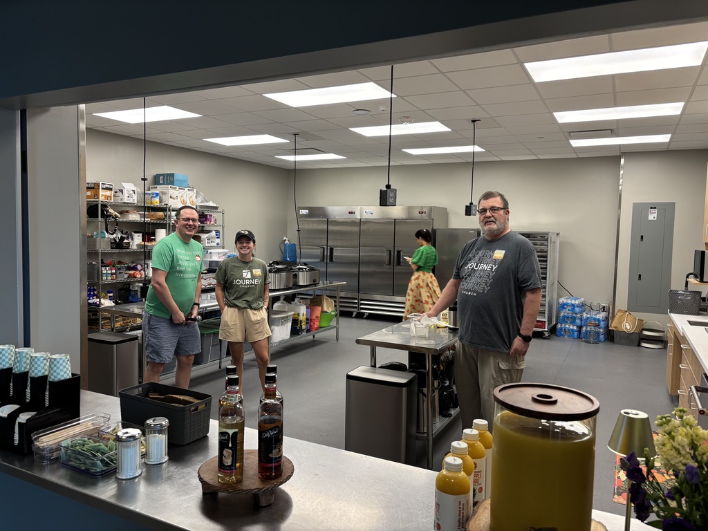 Journey Church kitchen working on breakfast in the kitchen to host the new staff members