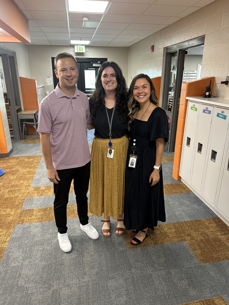 teachers smiling for a picture