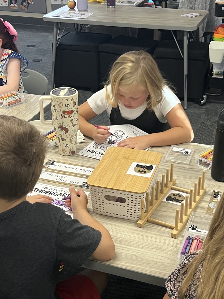 student works at her seat