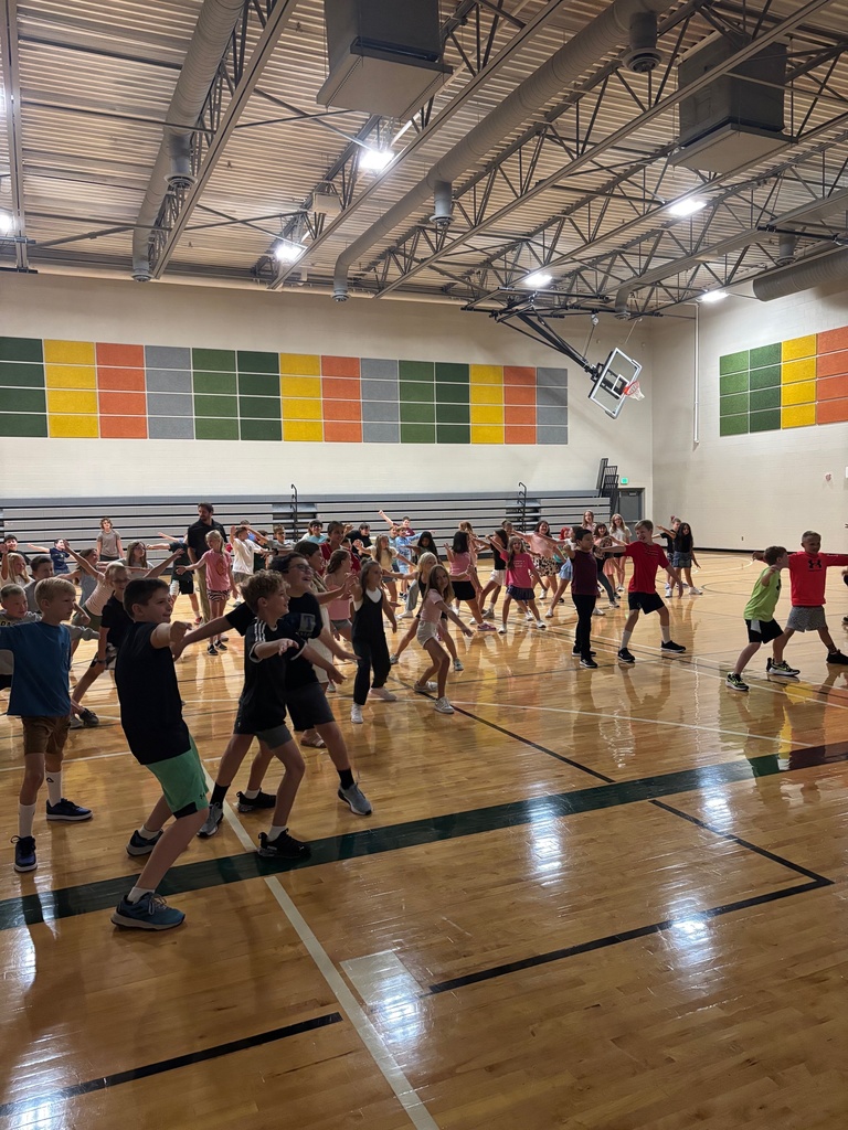students dancing in the gym