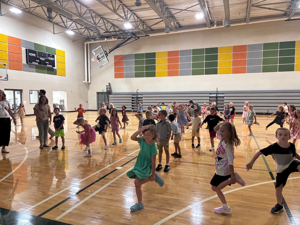 students dancing in the gym